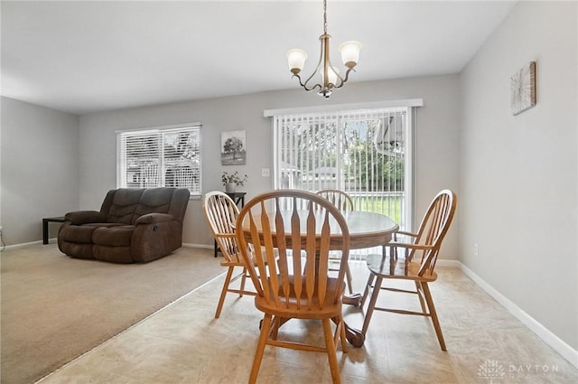 1360 Fenway Ct, Centerville, OH 45458 - dining space with a chandelier and baseboards