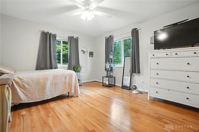 1360 Fenway Ct, Centerville, OH 45458 - bedroom with multiple windows, light wood-style flooring, and ceiling fan
