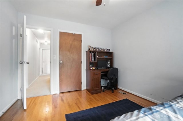 1360 Fenway Ct, Centerville, OH 45458 - bedroom with light wood-type flooring, an office area, and a ceiling fan