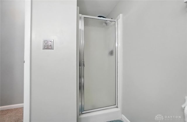 1360 Fenway Ct, Centerville, OH 45458 - bathroom with a shower stall and baseboards