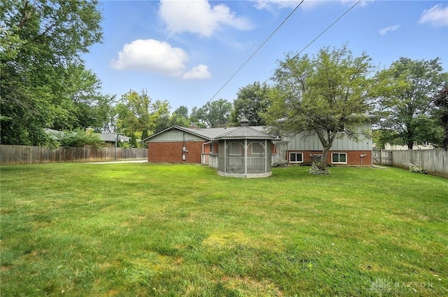 1360 Fenway Ct, Centerville, OH 45458 - fenced backyard featuring a sunroom