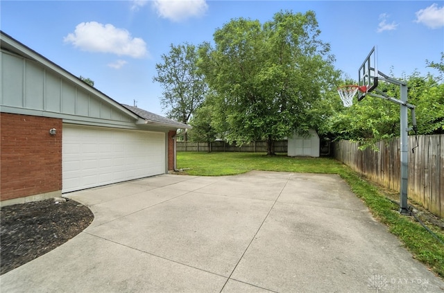 1360 Fenway Ct, Centerville, OH 45458 - garage featuring a shed and concrete driveway