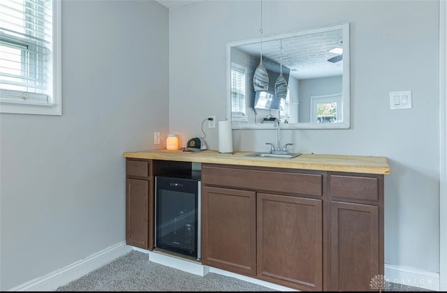 7143 S State Route 123, Blanchester, OH 45107 - indoor bar with beverage cooler and light carpet