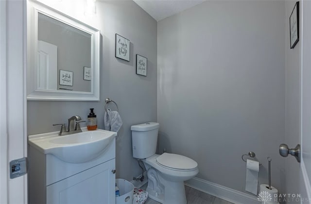 7143 S State Route 123, Blanchester, OH 45107 - bathroom featuring toilet and vanity