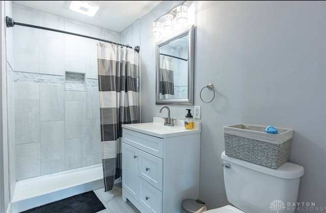 7143 S State Route 123, Blanchester, OH 45107 - full bathroom featuring vanity and tiled shower