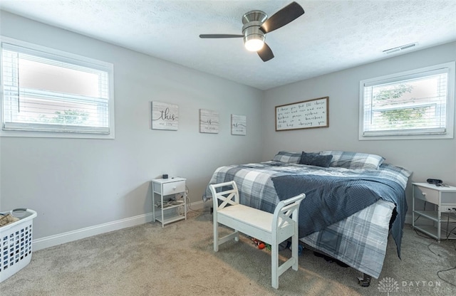 7143 S State Route 123, Blanchester, OH 45107 - carpeted bedroom with ceiling fan and a textured ceiling
