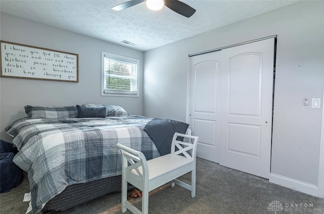 7143 S State Route 123, Blanchester, OH 45107 - bedroom with carpet floors, a textured ceiling, ceiling fan, and a closet