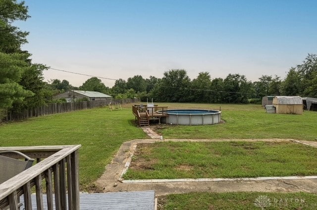 7143 S State Route 123, Blanchester, OH 45107 - view of green lawn featuring a shed