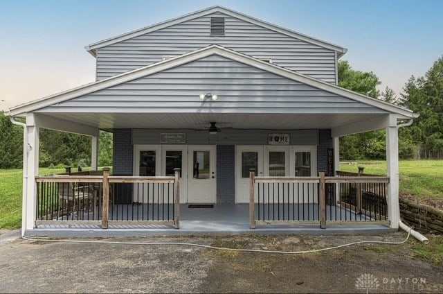 7143 S State Route 123, Blanchester, OH 45107 - view of front facade with covered porch and ceiling fan