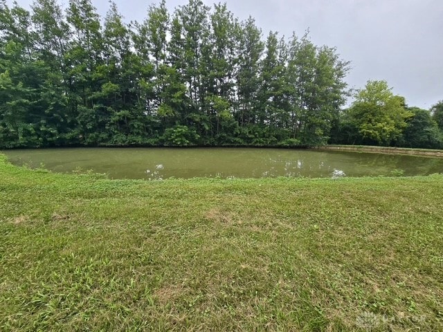 7143 S State Route 123, Blanchester, OH 45107 - view of grassy yard featuring a water view