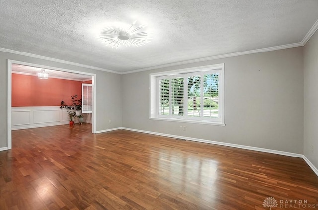 1572 Frontier Ct, Dayton, OH 45458 - spare room featuring a textured ceiling, wood finished floors, and crown molding