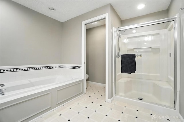 1572 Frontier Ct, Dayton, OH 45458 - bathroom featuring a stall shower and a garden tub
