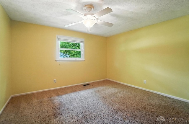1572 Frontier Ct, Dayton, OH 45458 - unfurnished room with carpet floors, a ceiling fan, and a textured ceiling