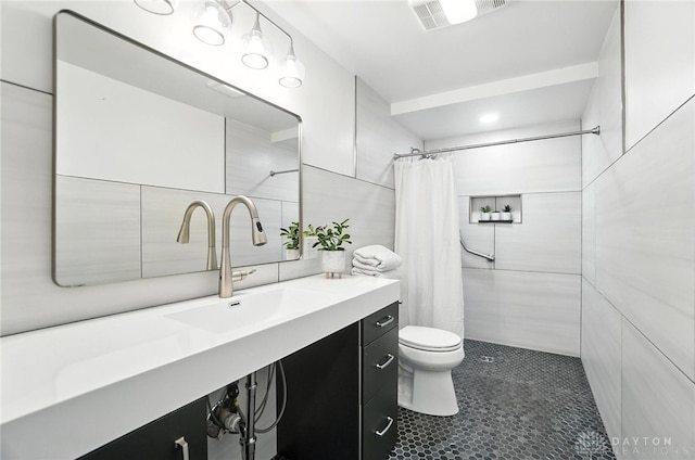 1572 Frontier Ct, Dayton, OH 45458 - full bath with vanity, curtained shower, tile patterned floors, and tile walls