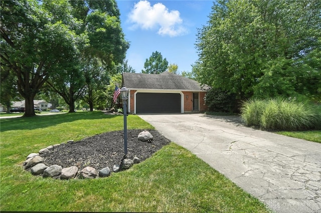 1572 Frontier Ct, Dayton, OH 45458 - view of front facade with brick siding, driveway, a front yard, and a garage