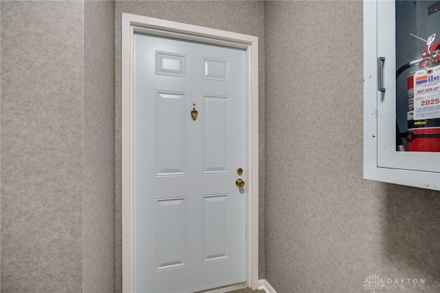 1311 Hollow Run Unit 6, Dayton, OH 45459 - view of exterior entry with stucco siding