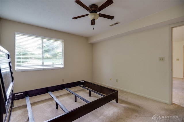 1311 Hollow Run Unit 6, Dayton, OH 45459 - unfurnished bedroom with light colored carpet and ceiling fan