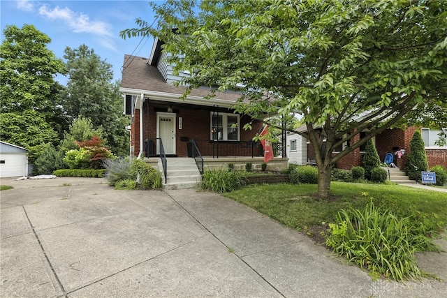 2594 Laura Ln, Norwood, OH 45212 - view of front of property featuring a porch and brick siding
