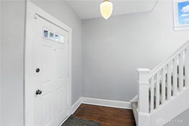 2594 Laura Ln, Norwood, OH 45212 - foyer featuring dark wood finished floors and stairs