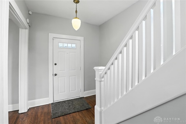 2594 Laura Ln, Norwood, OH 45212 - foyer entrance featuring wood finished floors and stairs