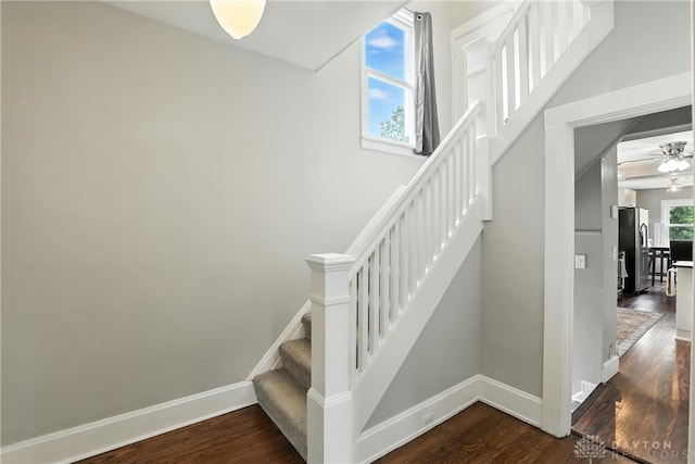 2594 Laura Ln, Norwood, OH 45212 - stairway with wood finished floors and ceiling fan
