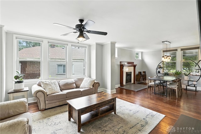 2594 Laura Ln, Norwood, OH 45212 - living room with plenty of natural light, a ceiling fan, wood finished floors, and crown molding