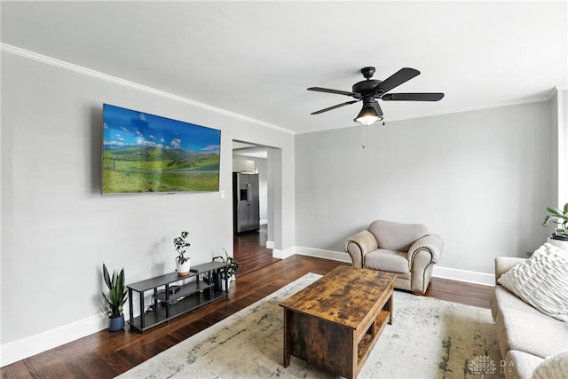 2594 Laura Ln, Norwood, OH 45212 - living area featuring crown molding, a ceiling fan, and wood finished floors