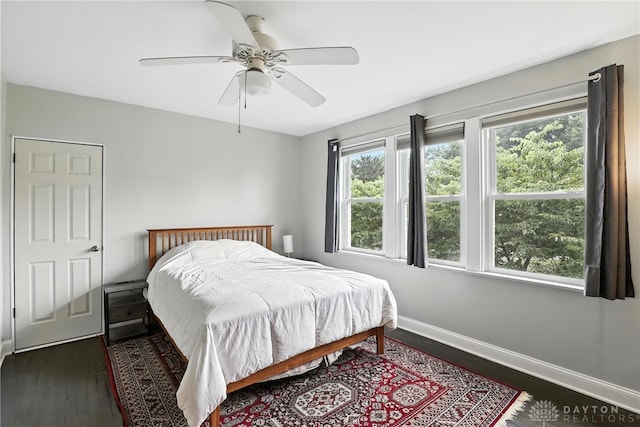 2594 Laura Ln, Norwood, OH 45212 - bedroom featuring dark wood-type flooring and a ceiling fan