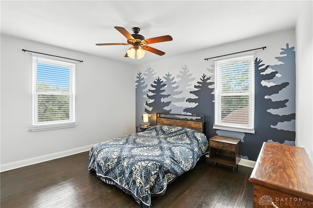 2594 Laura Ln, Norwood, OH 45212 - bedroom featuring hardwood / wood-style flooring, multiple windows, and a ceiling fan