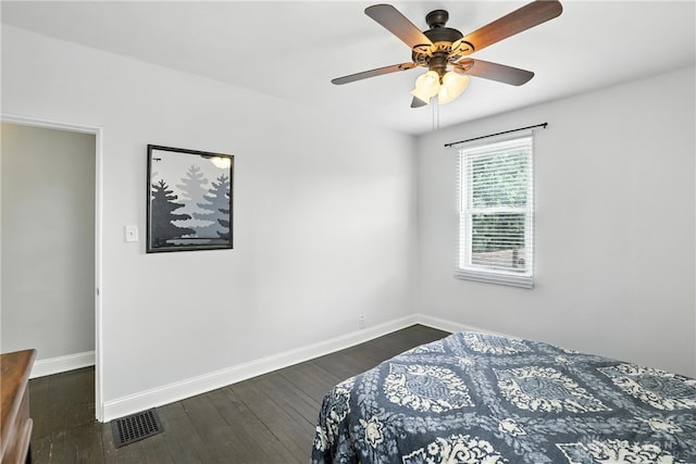 2594 Laura Ln, Norwood, OH 45212 - bedroom with dark wood finished floors and a ceiling fan