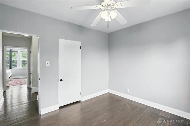 2594 Laura Ln, Norwood, OH 45212 - unfurnished room featuring dark wood finished floors and ceiling fan