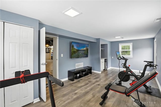 2594 Laura Ln, Norwood, OH 45212 - exercise room with wood finished floors and baseboards
