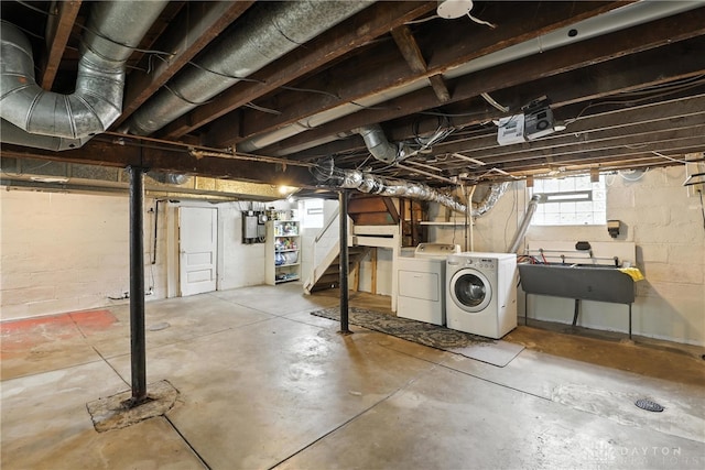 2594 Laura Ln, Norwood, OH 45212 - basement featuring washer and clothes dryer and stairway
