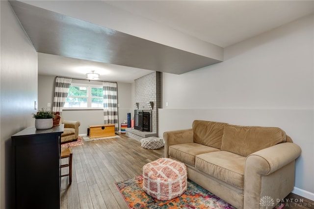 1817 El Camino Dr, Xenia, OH 45385 - living room featuring wood finished floors and a fireplace
