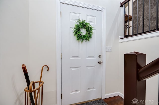 1817 El Camino Dr, Xenia, OH 45385 - foyer with baseboards and dark wood finished floors