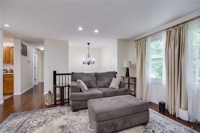 1817 El Camino Dr, Xenia, OH 45385 - living room featuring dark wood finished floors, a chandelier, and recessed lighting