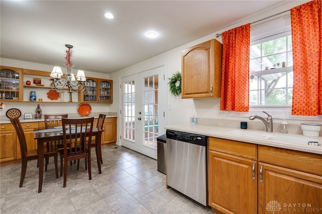 1817 El Camino Dr, Xenia, OH 45385 - kitchen with stainless steel dishwasher, a chandelier, french doors, light countertops, and recessed lighting