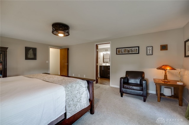 1817 El Camino Dr, Xenia, OH 45385 - bedroom with light carpet and ensuite bathroom