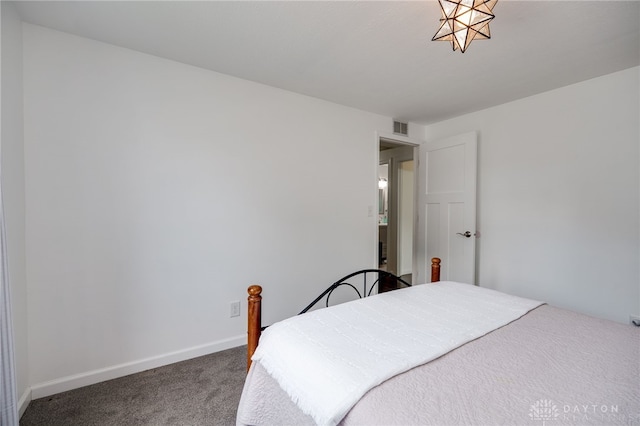 1817 El Camino Dr, Xenia, OH 45385 - carpeted bedroom featuring baseboards
