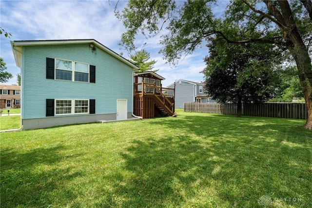 1817 El Camino Dr, Xenia, OH 45385 - rear view of house featuring stairway and a wooden deck