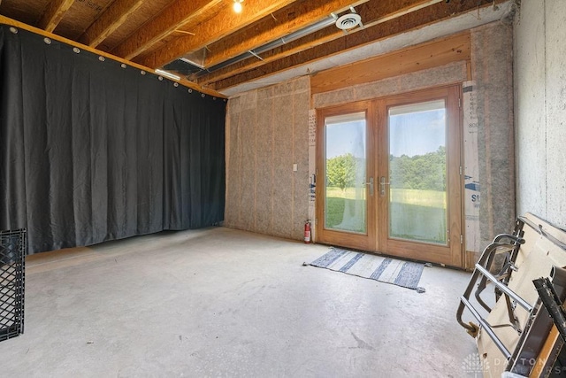 7373 Crowl Rd, Degraff, OH 43318 - miscellaneous room with unfinished concrete floors and french doors