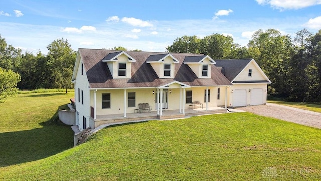 7373 Crowl Rd, Degraff, OH 43318 - cape cod-style house with covered porch, a front yard, driveway, and a shingled roof