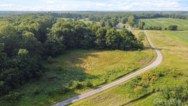 7373 Crowl Rd, Degraff, OH 43318 - drone / aerial view of a heavily wooded area