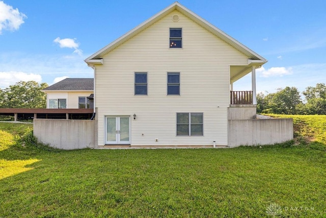 7373 Crowl Rd, Degraff, OH 43318 - rear view of house with french doors and a yard