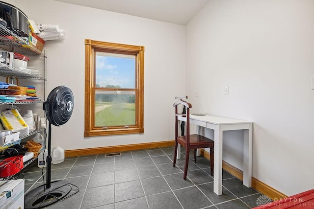 7373 Crowl Rd, Degraff, OH 43318 - home office with baseboards and dark tile patterned floors