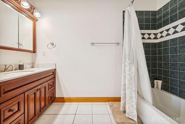 7373 Crowl Rd, Degraff, OH 43318 - full bath featuring vanity, tile patterned floors, and shower / bath combo with shower curtain