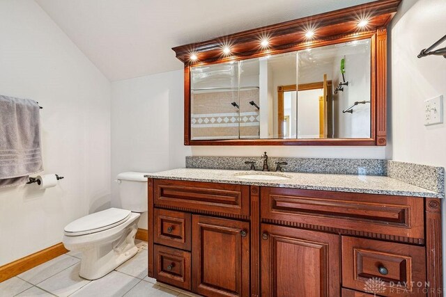7373 Crowl Rd, Degraff, OH 43318 - full bath with vanity, lofted ceiling, tiled shower, and tile patterned flooring