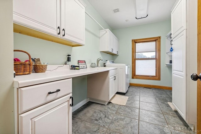7373 Crowl Rd, Degraff, OH 43318 - laundry room featuring cabinet space, washing machine and dryer, and light tile patterned floors