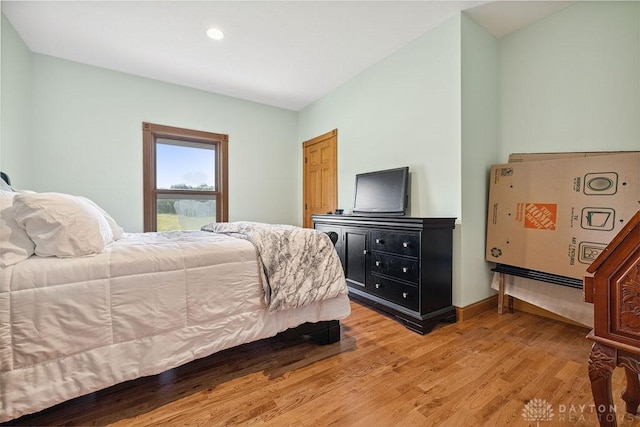 7373 Crowl Rd, Degraff, OH 43318 - bedroom with light wood-style floors and recessed lighting