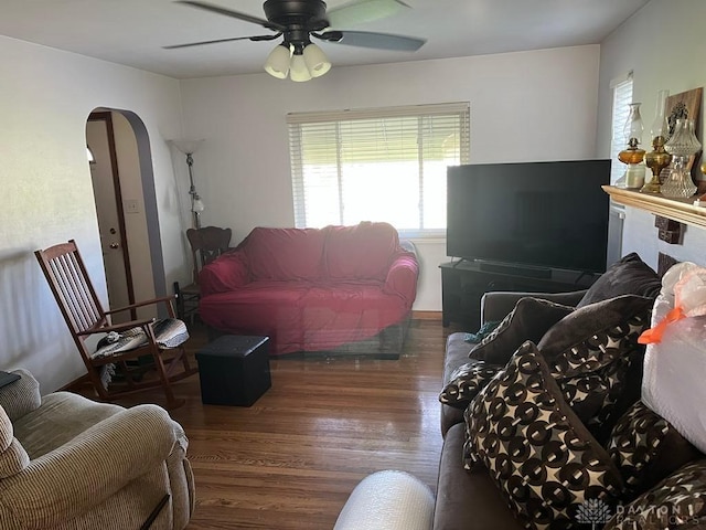 5747 N Springboro Pike, Dayton, OH 45449 - living room with arched walkways, plenty of natural light, ceiling fan, and wood finished floors